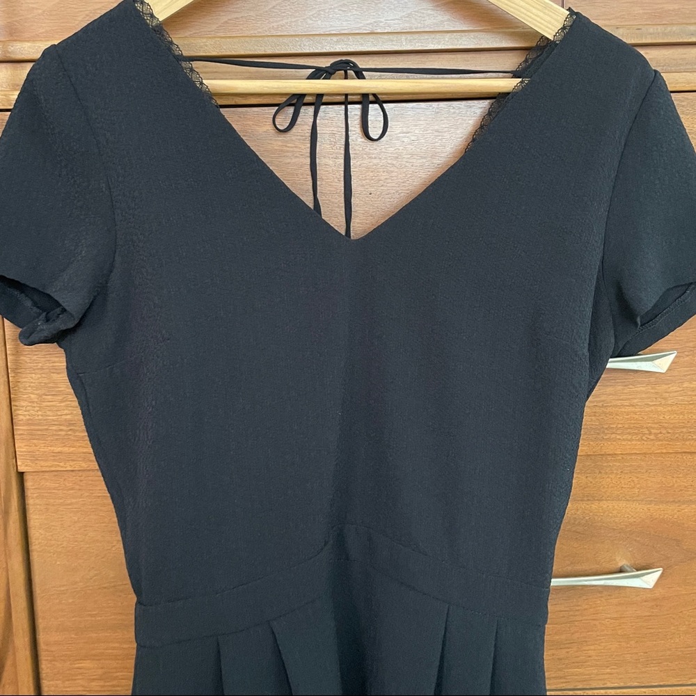 Sezane black short dress, cross back V-neck with tie, cap sleeves, lace detail